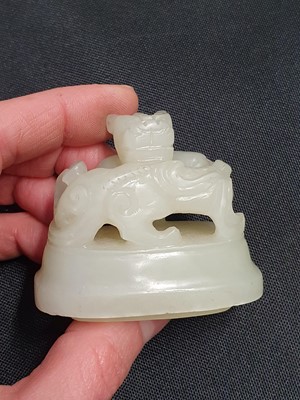 Lot 253 - A CHINESE PALE CELADON JADE VASE AND COVER.