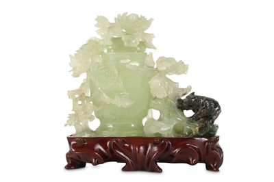 Lot 276 - A Chinese serpentine 'bear' vase and cover.