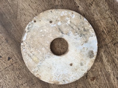 Lot 111 - THREE CHINESE JADE BI DISKS.