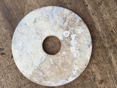 Lot 111 - THREE CHINESE JADE BI DISKS.