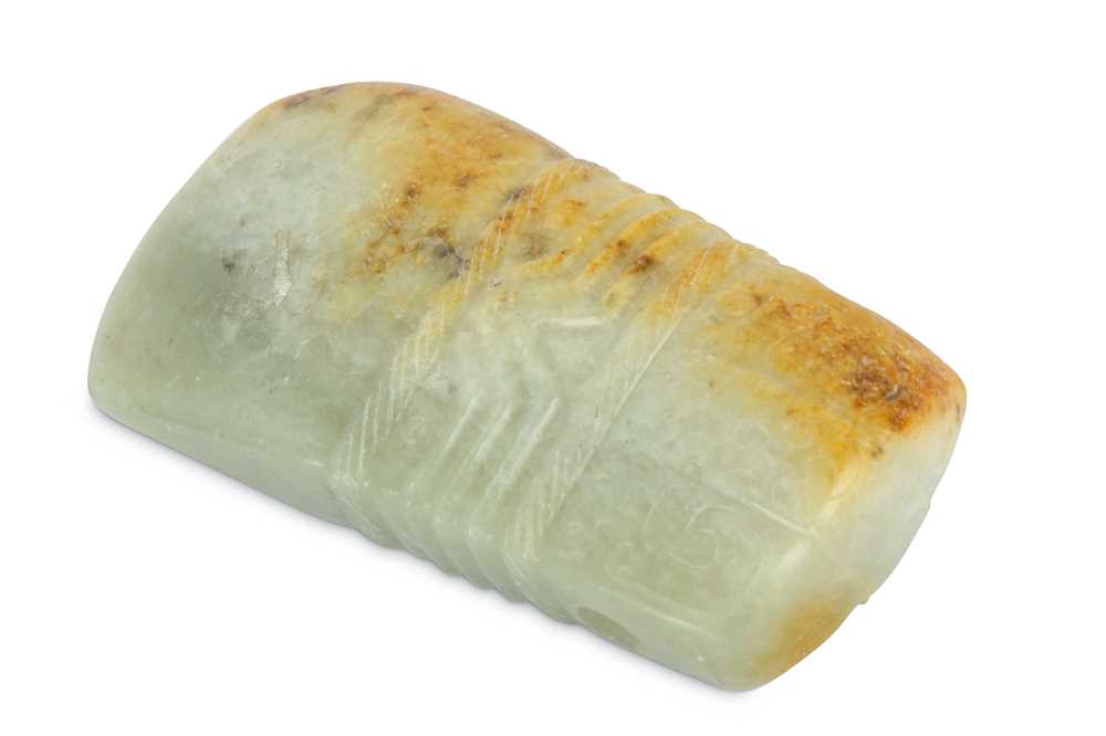 Lot 178 - A CHINESE PALE CELADON JADE ARCHAISTIC BLADE.