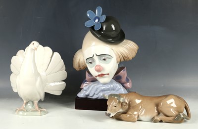 Lot 151 - Three Lladro figures include clowns head, dove...