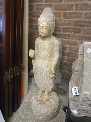 Lot 555 - A CHINESE GILT-STONE FIGURE OF A BUDDHA.