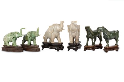 Lot 318 - Three pairs of Chinese hardstone animals.