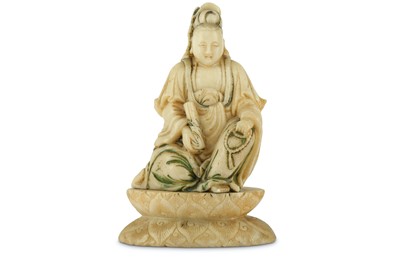 Lot 437 - A CHINESE SOAPSTONE FIGURE OF GUANYIN. Qing...