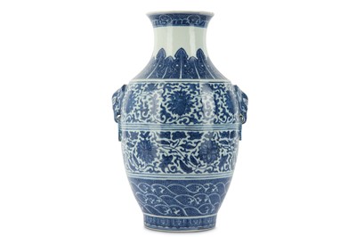 Lot 96 - A BLUE AND WHITE TWIN-HANDLED VASE. Qing...