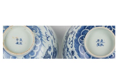Lot 529 - A PAIR OF CHINESE BLUE AND WHITE 'DRAGON' BOWLS.