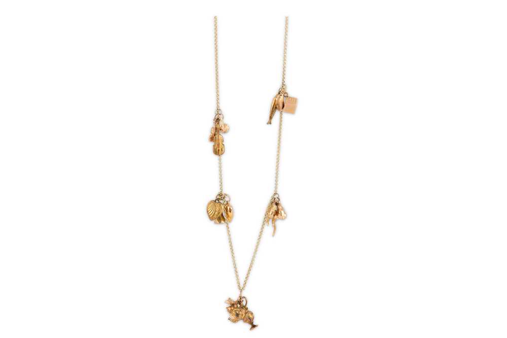 Lot 24 - A gold charm necklace