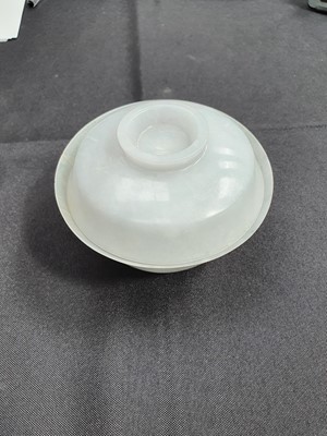 Lot 577 - A CHINESE JADEITE BOWL AND COVER.