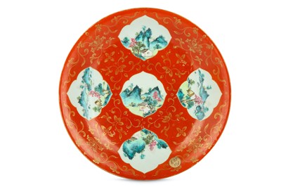 Lot 355 - A CHINESE FAMILLE ROSE CORAL-GROUND DISH. Qing...