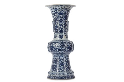 Lot 204 - A CHINESE BLUE AND WHITE 'DRAGON' VASE, GU. ...
