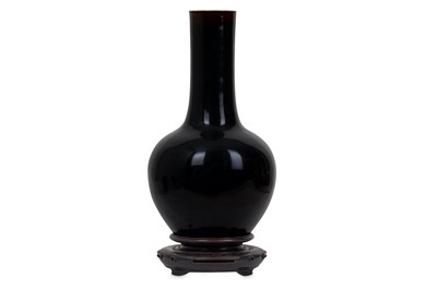 Lot 167 - A CHINESE BROWN-GLAZED BOTTLE VASE. The ovoid...
