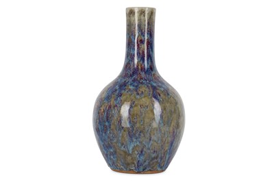 Lot 306 - A CHINESE FLAMBÉ BOTTLE VASE. The ovoid body...