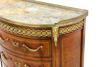 Lot 135 - A French demi-lune chest with a marble top and...