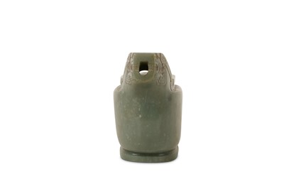 Lot 64 - A CHINESE PALE CELADON JADE ARCHAISTIC POURING VESSEL.
