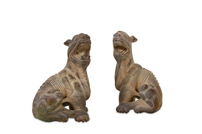 Lot 67 - A PAIR OF CHINESE JADE FIGURES OF LIONS.