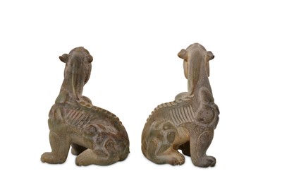 Lot 67 - A PAIR OF CHINESE JADE FIGURES OF LIONS.