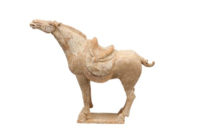 Lot 40 - A CHINESE POTTERY MODEL OF A HORSE.
