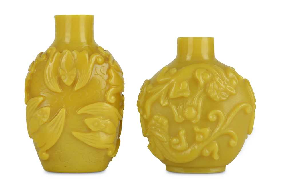 Lot 300 Two Chinese yellow glass snuff bottles.