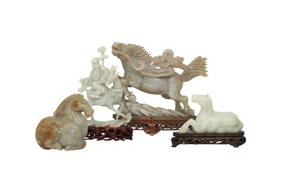 Lot 582 - FOUR CHINESE JADE AND JADEITE CARVINGS.