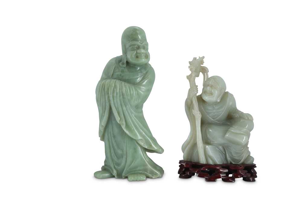 Lot 672 TWO CHINESE JADE CARVINGS OF LUOHANS.