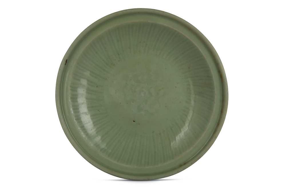 Lot 43 - A CHINESE LONGQUAN CELADON CHARGER. Ming...