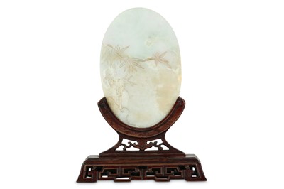 Lot 57 - A CHINESE WHITE JADE OVAL TABLE SCREEN. Carved...
