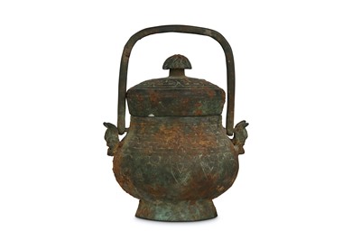 Lot 157 - A CHINESE BRONZE HANGING VASE AND COVER. Han...