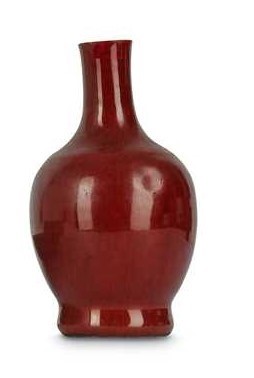 Lot 217 - A Chinese ox blood vase.