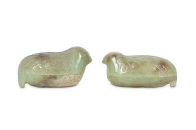 Lot 286 - A pair of Chinese pale celadon jade 'quail' boxes and covers.