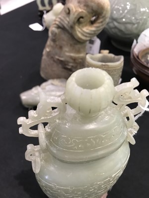 Lot 512 - A COLLECTION OF THREE CHINESE CARVED JADE VASES AND COVERS.