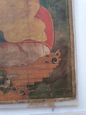 Lot 391 - A TIBETAN THANGKA OF GELUPA LAMA.