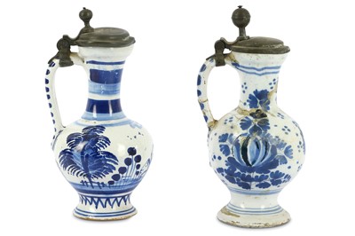 Lot 384 - Two 18th Century German Hanau Fayence blue and white pewter mounted flagons