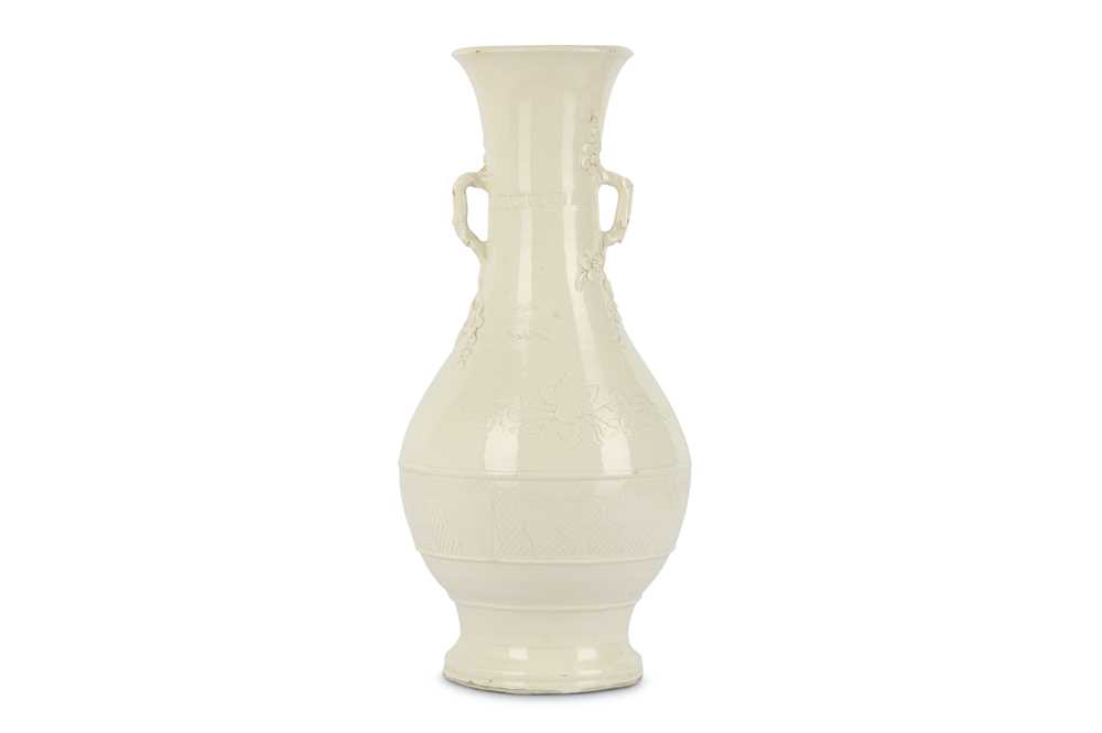 Lot 178 - A CHINESE BLANC-DE-CHINE ‘BLOSSOMS’ VASE. Qing...