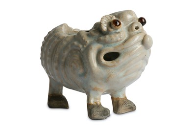 Lot 558 - A CHINESE PALE BLUE-GLAZED BISCUIT...