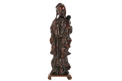 Lot 433 - A CHINESE ROOTWOOD CARVING OF A LADY. Qing...