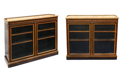 Lot 120 - A pair of ebonised, walnut and gilt metal...