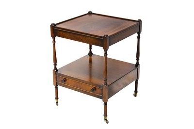 Lot 157 - A mahogany two tier occasional table with a...