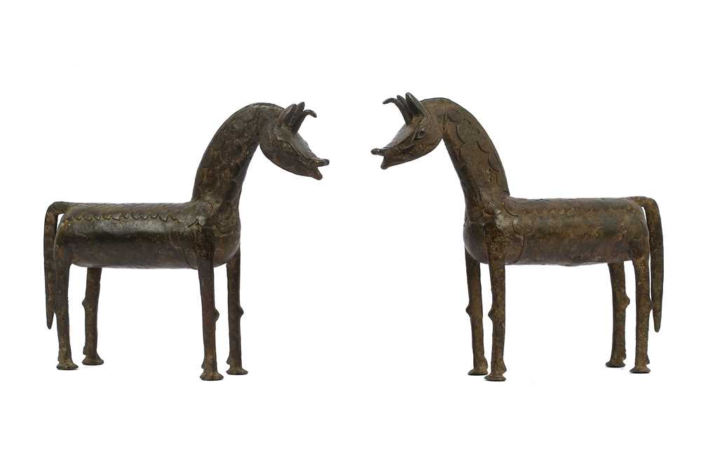 Lot 235 - A PAIR OF 20TH CENTURY EAST NIGERIAN BRONZE...