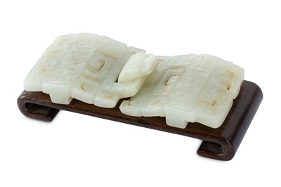 Lot 512 - A CHINESE WHITE JADE ARCHAISTIC BELT HOOK....