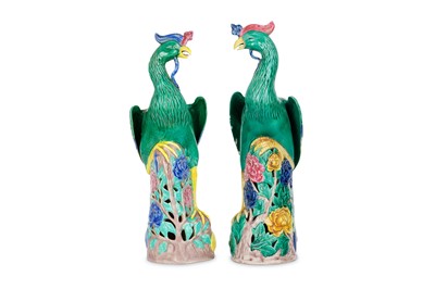 Lot 560 - A PAIR OF CHINESE FAMILLE ROSE PHOENIX BIRDS....