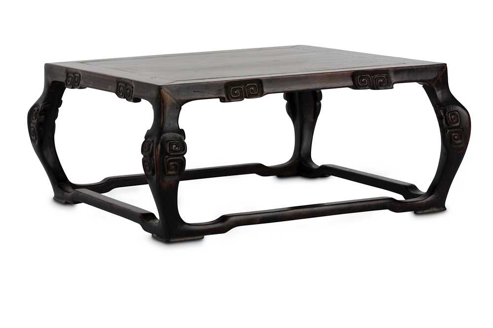 Lot 269 - A CHINESE WOOD STAND. Late Qing Dynasty. The...