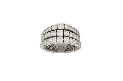 Lot 132 - A diamond dress ring Designed as a triple...