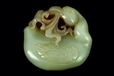 Lot 266 - A Chinese celadon jade carving of a duck with...