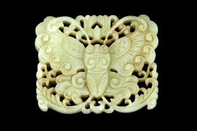 Lot 267 - A Chinese celadon jade pierced and carved...