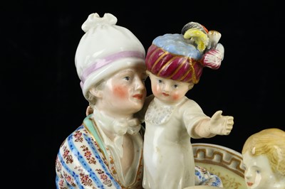 Lot 114 - A Meissen figural group of figures 'The Good...