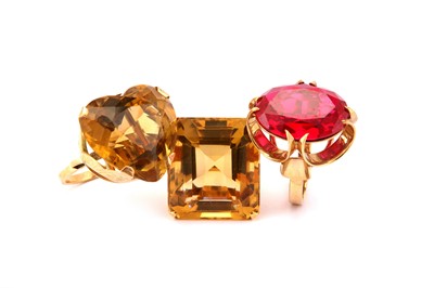 Lot 34 - Three gem-set rings, comprising two citrine...