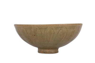 Lot 314 - A CHINESE CELADON-GLAZED 'LOTUS' BOWL. Song /...