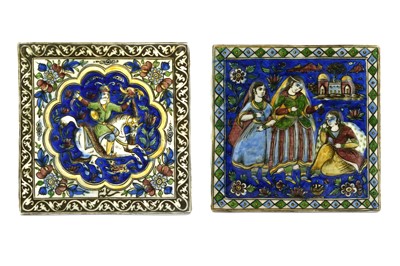 Lot 185 - TWO QAJAR POLYCHROME-PAINTED MOULDED POTTERY TILES