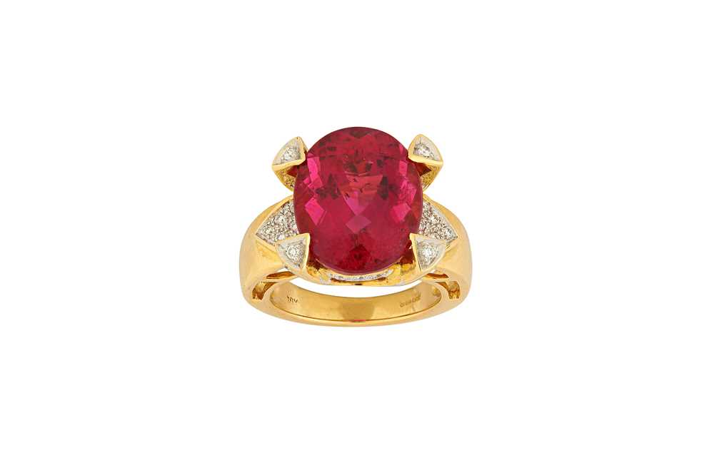 Lot 28 - A pink tourmaline and diamond dress ring The...